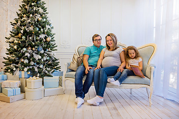 Image showing Family portrait near christmas tree