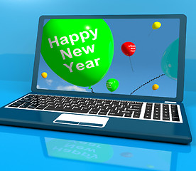 Image showing Laptop Computer With Happy New Year Message