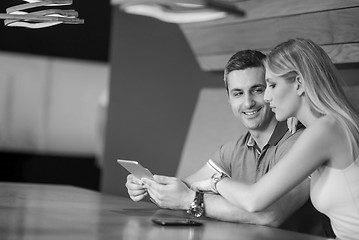 Image showing couple using tablet at home