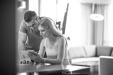 Image showing couple using tablet at home