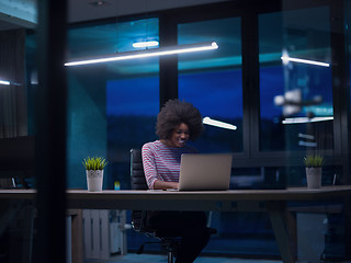 Image showing black businesswoman using a laptop in startup office