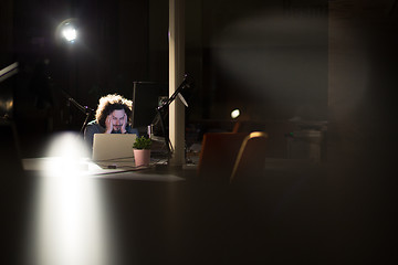 Image showing businessman relaxing at the desk