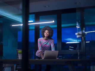 Image showing black businesswoman using a laptop in startup office