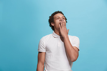 Image showing Beautiful bored man bored isolated on blue background