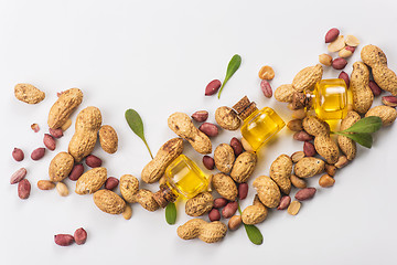 Image showing Natural peanut with oil in a glass