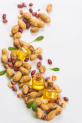 Image showing Natural peanut with oil in a glass