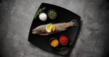 Image showing Plate with fish and spices