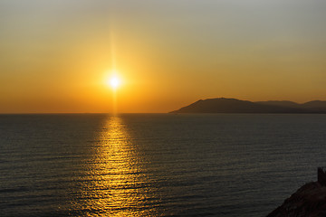 Image showing Beautiful sunset on smooth Black sea in summer