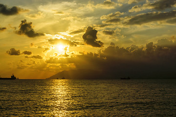 Image showing Magnificent scenery and ships in sea at sunset