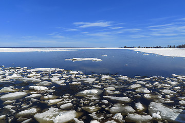 Image showing Landscape of lumps of melting ice on lake in spring