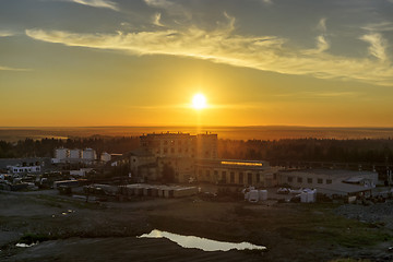 Image showing Old demolished industrial factory at sunset