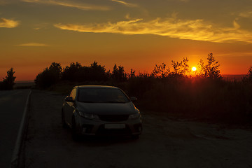 Image showing Traveling car overnight stopover on roadside at sunset