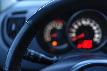 Image showing Bokeh and dashboard and steering wheel