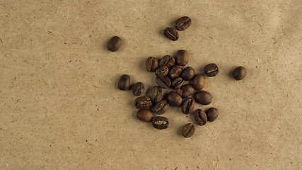 Image showing Beans of natural coffee on coarse paper