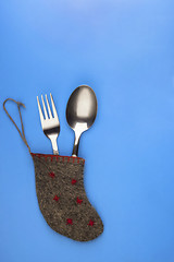 Image showing Fork and spoon in plain christmas sock