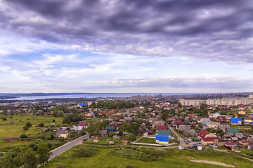 Image showing Aerial panorama of one-storied district of city outskirts