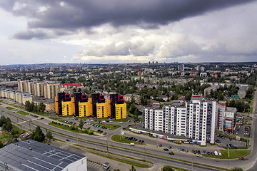 Image showing Gloomy clouds over the city, aerial view