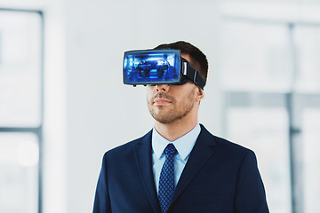 Image showing businessman with virtual reality headset at office