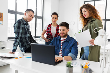 Image showing creative team working on user interface at office