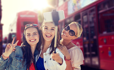 Image showing group of smiling women taking selfie in london