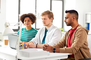 Image showing creative team with laptop working at office