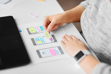 Image showing web designer working on user interface wireframe