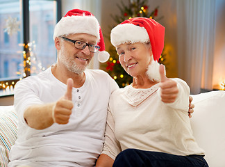 Image showing happy senior couple at home on christmas