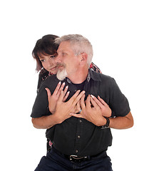 Image showing Middle age couple embracing