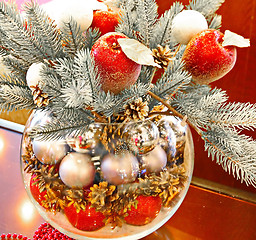 Image showing Christmas holidays composition with red apples, silver balls, andglass vase