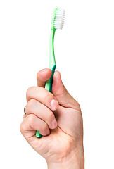 Image showing Hand with toothbrush on white 