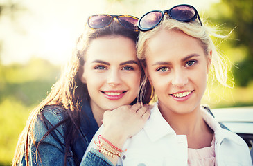 Image showing happy young women or teenage girls outdoors