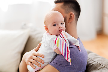 Image showing father with little baby girl at home