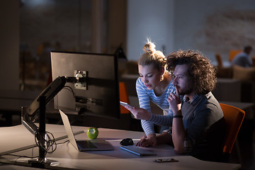 Image showing young designers in the night office