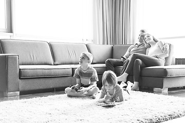 Image showing couple spending time with kids