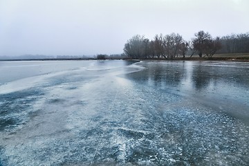 Image showing Skating on a lake