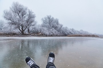 Image showing Skating on a lake