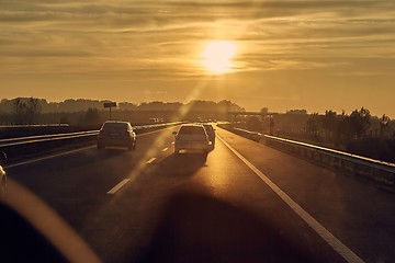 Image showing Driving in sunset