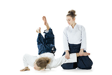 Image showing Man and woman fighting at Aikido training in martial arts school