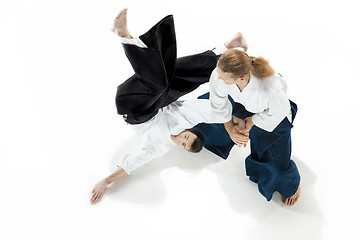 Image showing The two men fighting at Aikido training in martial arts school