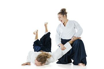 Image showing Man and woman fighting at Aikido training in martial arts school