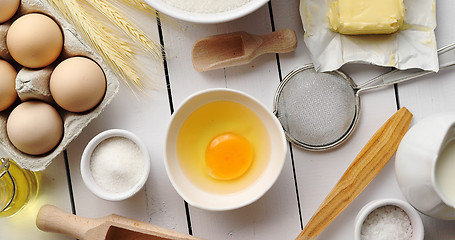 Image showing Utensils and pastry ingredients on table