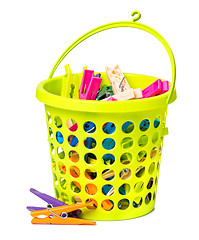 Image showing Clothespin in green bucket