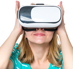 Image showing Woman looking in VR glasses