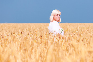 Image showing Woman at wheat meadow