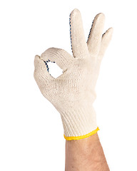 Image showing Male hand wearing working glove