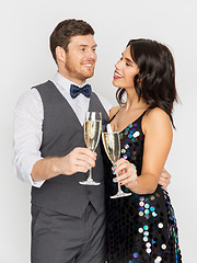 Image showing happy couple with champagne glasses at party