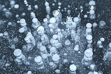 Image showing Winter ice with gas bubbles trapped