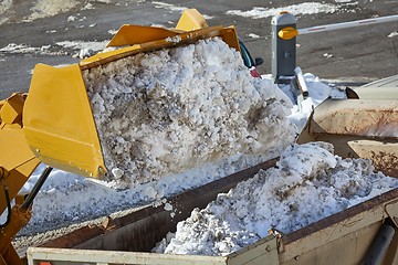 Image showing Loader removing snow from street