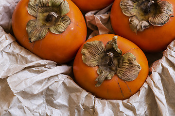 Image showing Kaki fruits (persimmon) in a box 