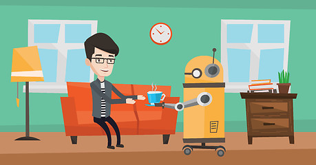 Image showing Domestic robot brings cup of coffee to his owner.